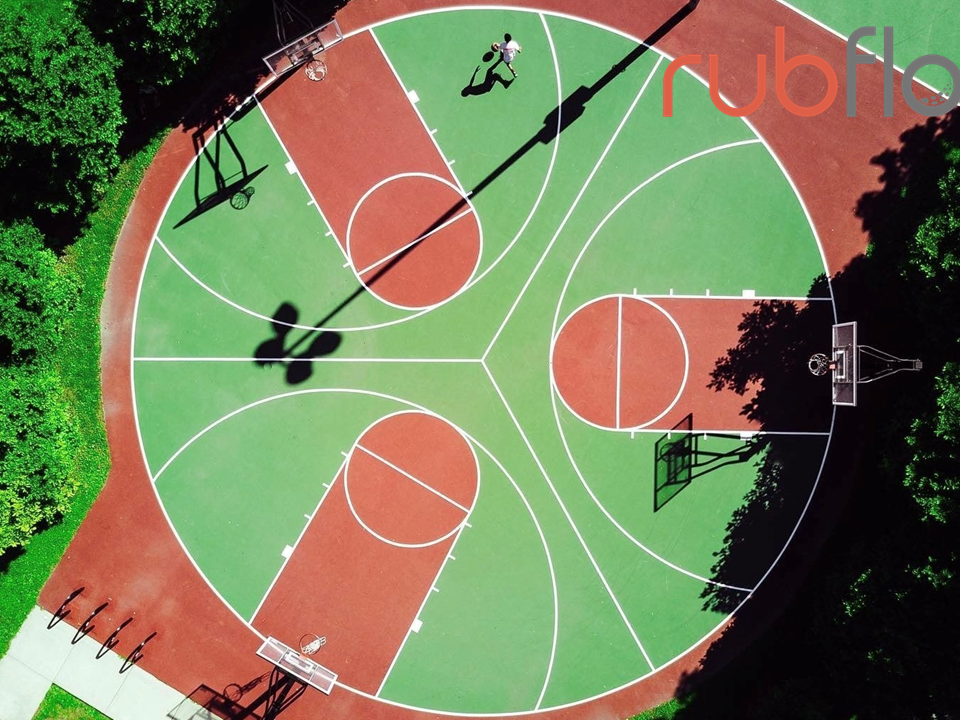Customized Silicon PU sports court with geometric court layout by Rubflo