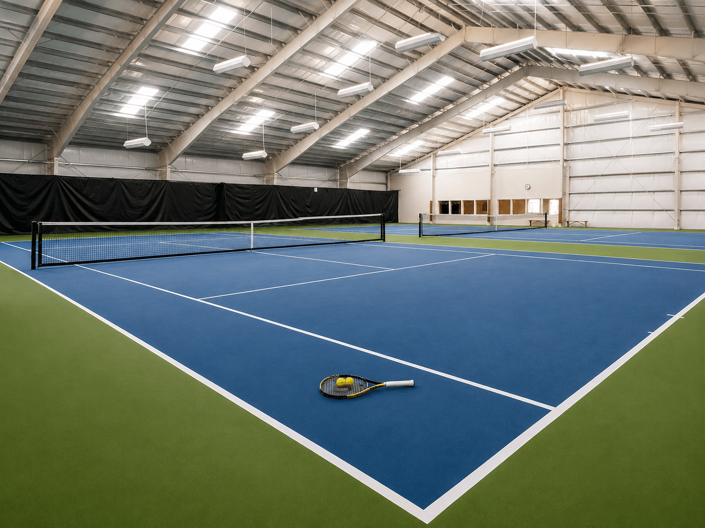 Tennis court flooring with rubber sports surface